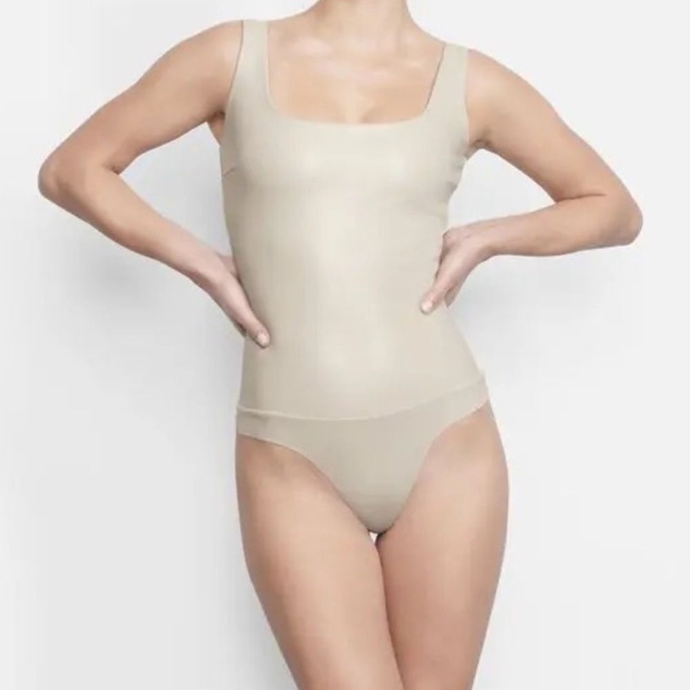 SKIMS Scoop Neck Faux Leather Beige Bodysuit in Cement